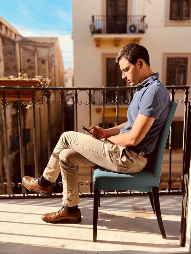 Alex reading a book in palermo